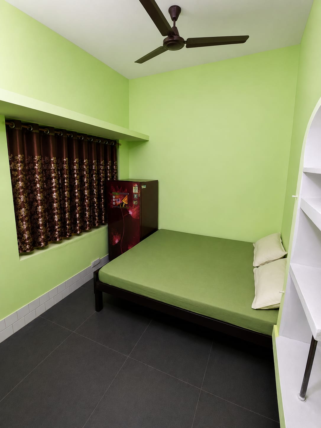 Updated clean private room with bed, window and storage at Safe Zone Foundation